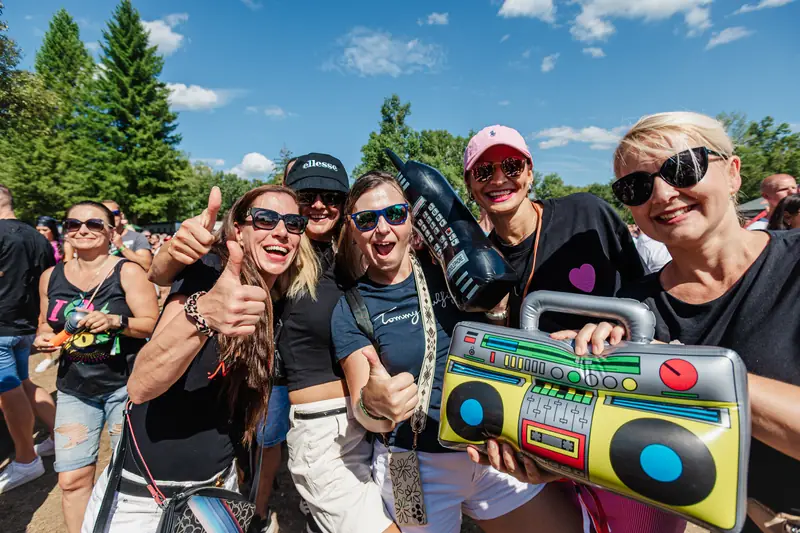 Fans with an inflatable boombox