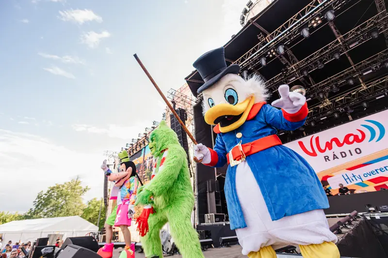 Cartoon mascots on stage