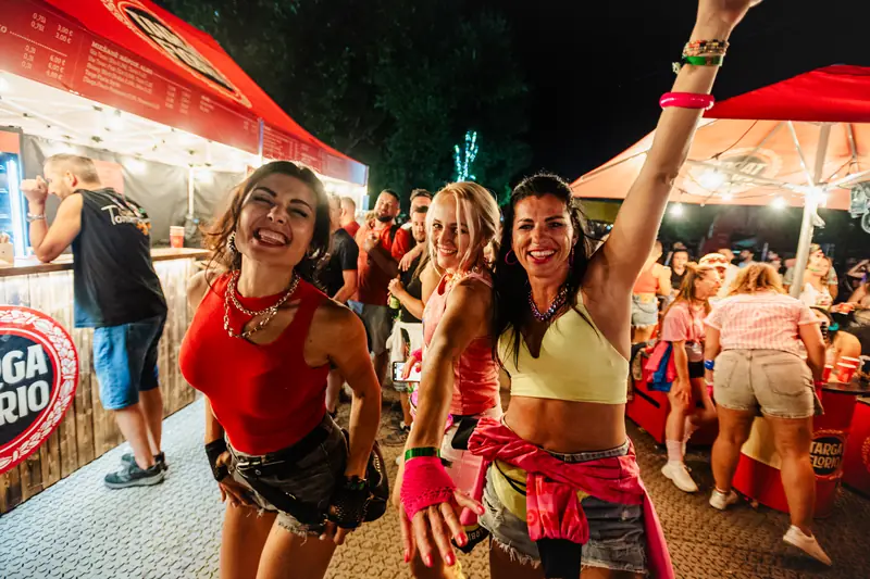 Dancing by the stalls on a festival night